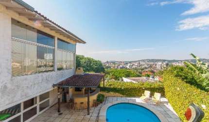 Casa com 5 quartos à venda na Rua Coroados, 526, Vila Assunção, Porto Alegre por R$ 1.280.000