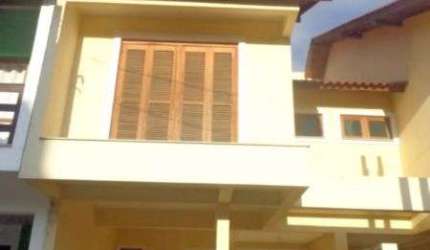 Casa em condomínio fechado com 3 quartos à venda na Rua Pau Brasil, 774, Hípica, Porto Alegre por R$ 425.000
