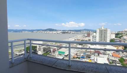 COBERTURA EXCLUSIVA COM VISTA DESLUMBRANTE PARA A PONTE HERCÍLIO LUZ E BEIRA-MAR CONTINENTAL — UM ESPETÁCULO DIÁRIO!