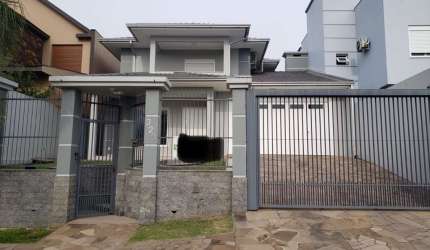 Casa com 3 quartos à venda na Pernambuco, 323, Centro, Portão por R$ 1.300.000