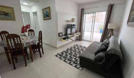 APARTAMENTO PRAIA GRANDE com 2 dormitórios sendo 1 suíte,1 vaga de garagem,varanda gourmet com churrasqueira,sala 2 ambientes