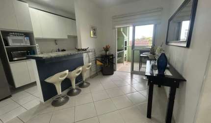 Apartamento à venda no bairro Barra da Lagoa com 2 dormitórios send o1 suíte,sala,cozinha e banheiro e varanda gourmet