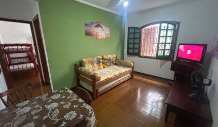 APARTAMENTO PRAIA GRANDE com 1 dormitório,1 vaga de garagem,sala de estar e cozinha