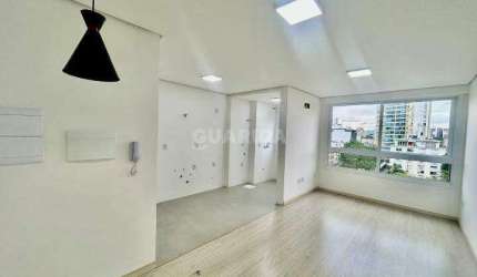 Apartamento com 1 dormitório suíte para alugar no bairro Menino Deus