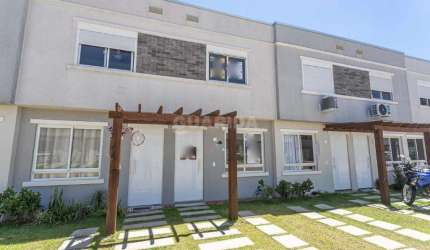 Casa em Condomínio com 2 dormitórios e 1 vaga de garagem no bairro Vila Nova