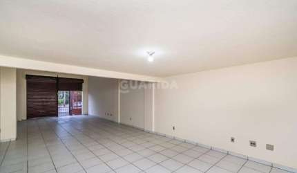 Loja comercial com mezanino e 100m² no bairro Partenon