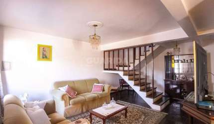 Casa Residencial com 4 dormitórios, sendo 1 suíte, e 2 vagas de garagem no bairro Vila Nova