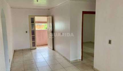 Casa residencial com 2 dormitórios, sendo 1 suíte com hidromassagem, no bairro Jardim Leopoldina.