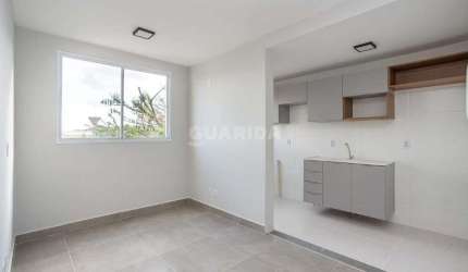 Apartamento com 2 dormitórios e 1 vaga de garagem no bairro Tristeza