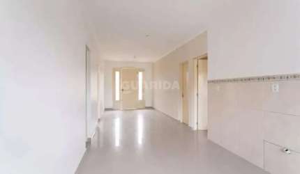 Casa residencial de 3 dormitórios, sendo 1 suíte, e 2 vagas de garagem no bairro Partenon - Porto Alegre/RS