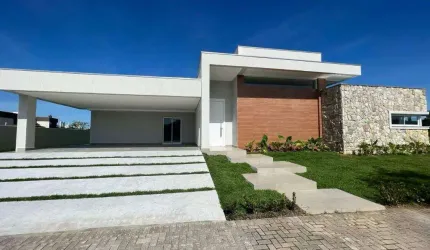 CASA EM CONDOMÍNIO FECHADO - 4 SUÍTES - 4 VAGAS - À 10 MINUTOS DA PRAIA - ÁREA DE LAZER