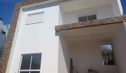 Casa em condomínio fechado com 3 quartos à venda na Avenida Dona Frutuosa, 969, Coronel Nassuca, Guaíba por R$ 1.390.000