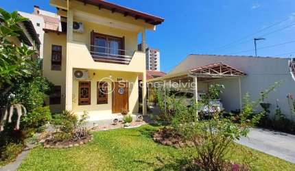Casa com 4 quartos à venda na Rua Cônego Estanislau Scherer, 295, Centro, Guaíba por R$ 1.190.000
