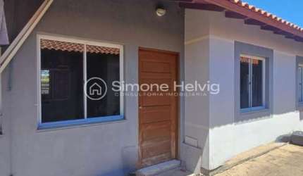 Casa em condomínio fechado com 2 quartos à venda na Rua Quinze, 591, Vila Pedras Brancas, Guaíba por R$ 200.000
