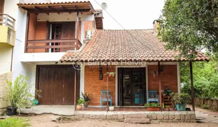 Casa com 3 quartos à venda na Avenida Assis Brasil, 260, Flórida, Guaíba por R$ 590.000
