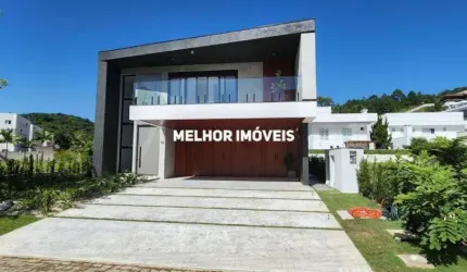 Horizontal Praia Brava - Casa Nova em condomínio fechado à venda com 5 suítes, 6 vagas de garagem localizada na Praia Brava .
