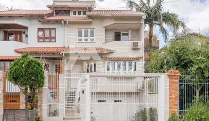 Casa com 3 quartos à venda na Rua Professor Isidoro La Porta, 112, Jardim Planalto, Porto Alegre por R$ 1.600.000