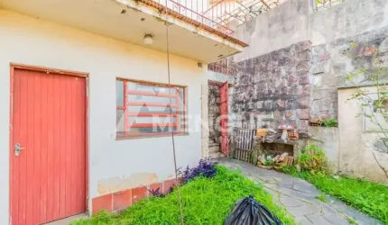 Casa com 3 quartos à venda na Rua Carlos Lacerda, 115, Jardim Itu Sabará, Porto Alegre por R$ 475.000