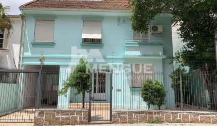Casa com 4 quartos à venda na Rua Xavier Ferreira, 113, Auxiliadora, Porto Alegre por R$ 900.000