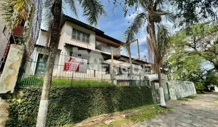 Casa com 3 quartos à venda na Avenida Quito, 415, Jardim Lindóia, Porto Alegre por R$ 1.500.000