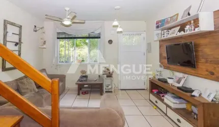 Casa em condomínio fechado com 3 quartos à venda na Rua Engenheiro Frederico Dahne, 255, Sarandi, Porto Alegre por R$ 385.000