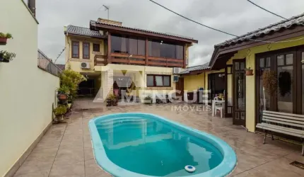 Casa com 4 quartos à venda na Travessa Porto Príncipe, 59, Jardim Lindóia, Porto Alegre por R$ 1.650.000