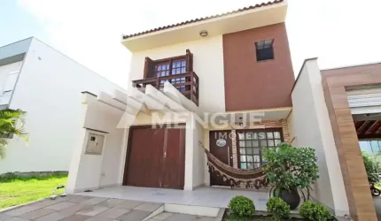 Casa em condomínio fechado com 3 quartos à venda na Rua Deputado Hugo Mardini, 1700, Passo das Pedras, Porto Alegre por R$ 878.000