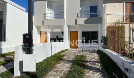 Casa com 3 quartos à venda na Rua Itacyr Rossi, 195, Guarujá, Porto Alegre por R$ 499.000