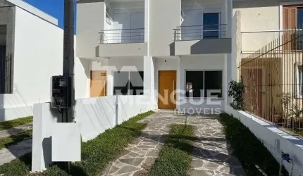 Casa com 3 quartos à venda na Rua Itacyr Rossi, 190, Guarujá, Porto Alegre por R$ 499.000