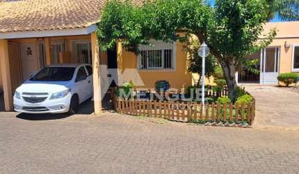 Casa em condomínio fechado com 2 quartos à venda na Rua Ruben Berta, 35, Jardim Leopoldina, Porto Alegre por R$ 245.000
