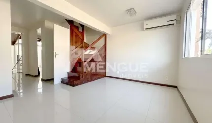 Casa em condomínio fechado com 3 quartos à venda na Avenida Faria Lobato, 1120, Sarandi, Porto Alegre por R$ 297.000