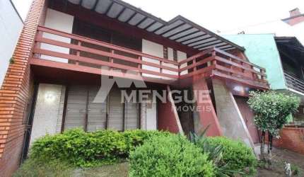 Casa com 4 quartos à venda na Rua Veronese, 52, São Sebastião, Porto Alegre por R$ 1.000.000