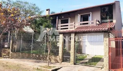 Casa com 4 quartos à venda na Rua Doutor Ricardo Gavenski, 235, Sarandi, Porto Alegre por R$ 990.000