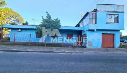 Casa com 3 quartos à venda na Rua Baden Powell, 644, Sarandi, Porto Alegre por R$ 490.000
