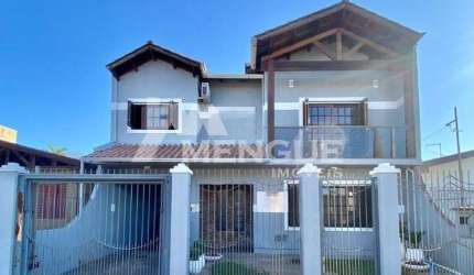 Casa com 4 quartos à venda na Rua Corrêa de Mello, 1060, Sarandi, Porto Alegre por R$ 795.000
