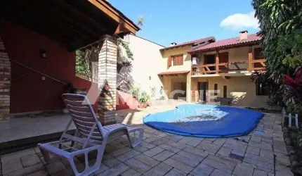 Casa com 3 quartos à venda na Rua Francisca Lechner, 343, Parque Santa Fé, Porto Alegre por R$ 650.000