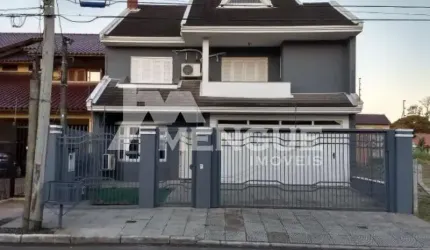Casa com 3 quartos à venda na Rua Hugo Nelson Magalhães, 280, Parque Santa Fé, Porto Alegre por R$ 958.000