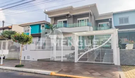 Casa em condomínio fechado com 4 quartos à venda na Rua Walter Porto Filho, 70, Mário Quintana, Porto Alegre por R$ 1.250.000