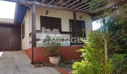 Casa com 3 quartos à venda na Rua Josef Halpern, 131, Jardim Leopoldina, Porto Alegre por R$ 420.000