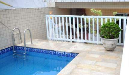 Casa sobreposta alta a venda em Santos, localizada no bairro do Embaré.