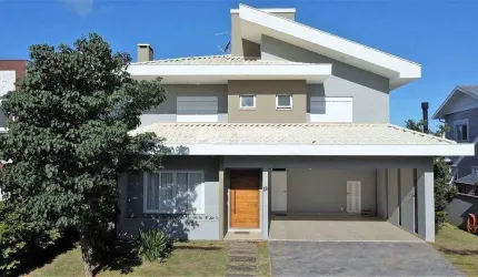 Casa à venda em condomínio horizontal, com 4 suítes, piscina e espaço gourmet, Campeche, Florianópo