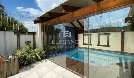 Elegance imóveis vende casa com 325m 4 dormitórios 2 suítes, piscina aquecida salão com churrasqueira e 3 vagas de garagem/box. Comprar R$1.890.000,00