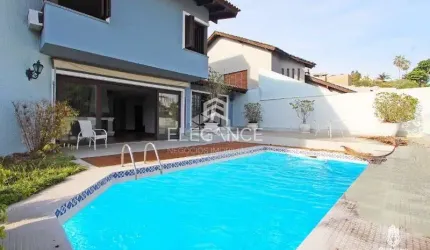 Elegance imóveis vende casa de 430m, 4 dormitórios, 3 suítes, living, piscina churrasqueira, adega e 8 vagas de garagem/box. Comprar R$ 2.400.000,00