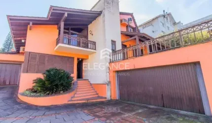 Casa com 5 quartos à venda na Rua Matias José Bins, 313, Três Figueiras, Porto Alegre por R$ 2.400.000