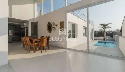 Elegance imóveis vende casa moderna 3 dormitórios suíte pátio com piscina 6 vagas box/garagem Chacara das Pedras Porto Alegre. Comprar R$ 2.700.000,00