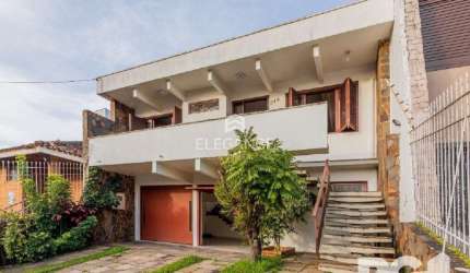 Casa com 3 quartos à venda na Rua Doutor Prudente de Moraes, 349, Chácara das Pedras, Porto Alegre, 280 m2 por R$ 1.490.000