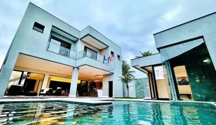Excelente Casa no Condomínio JD. Acapulco , mobiliado , com 525 m²  a.c., 5 dorms., (sendo 5 suítes), 7 banheiros, totalmente mobiliada, 4 vagas de garagem. REF: 19.984