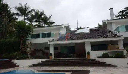 Excelente casa em cond. fechado no Guarujá, 1260 m² a.t., 480m² a.c., 6 quartos (6 suítes), área gourmet, jacuzzi, piscina, 6 vagas (REF 18.041)