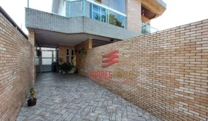 Casa com 3 dormitórios à venda, 116 m² por R$ 682.000,00 - Vila Valença - São Vicente/SP