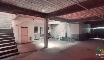 Garagem com 4 vagas duas salas e banheiro